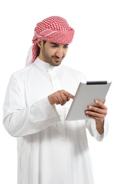 Arab man browsing a digital tablet clipart