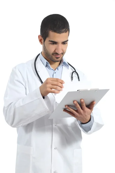 Arab doctor man reading a medical history — Stock Photo, Image