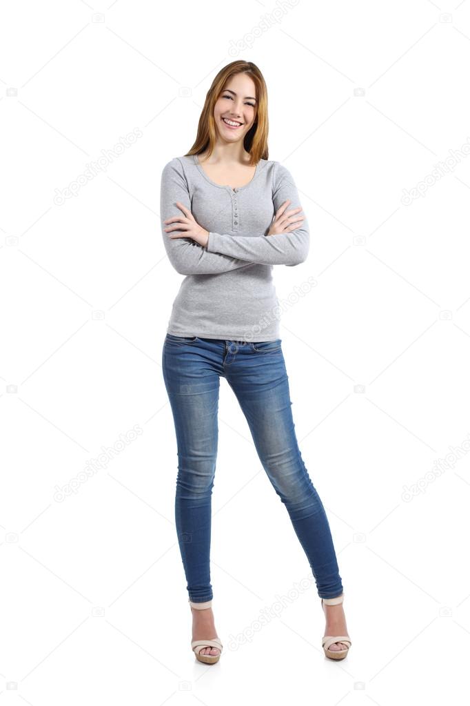 Confident full body of a casual happy woman standing wearing jeans