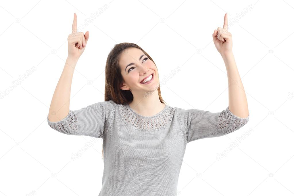 Happy woman pointing up with both hands