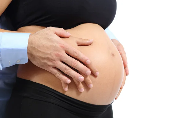 Pareja tocando con sus manos el vientre de la mujer embarazada — Foto de Stock