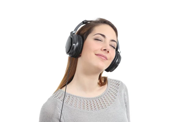 Woman listening to the music with headphones and eyes closed — Stock Photo, Image