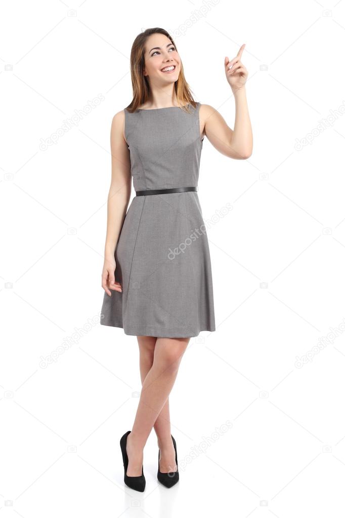 Full body of a standing woman pointing at side