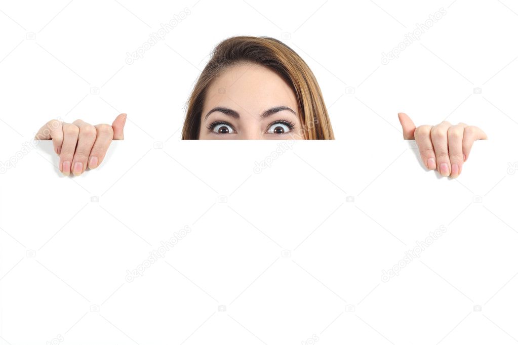Surprised woman eyes over a blank promotional display