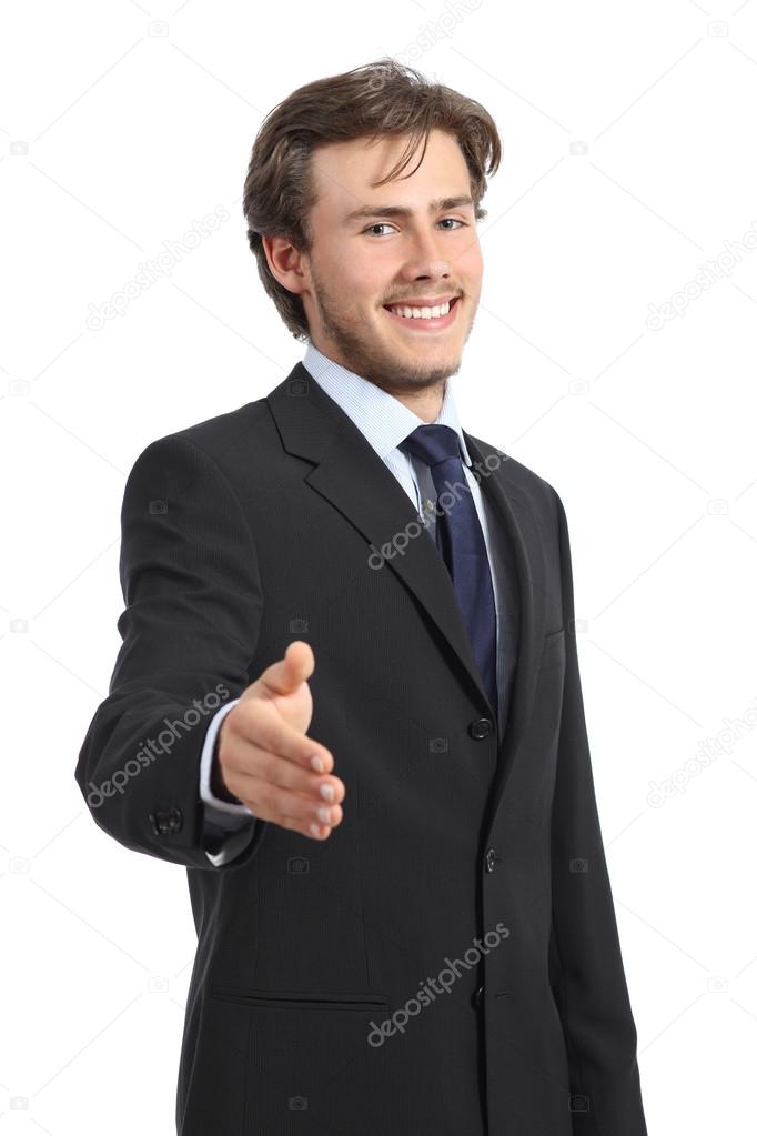 Young happy business man ready to handshake
