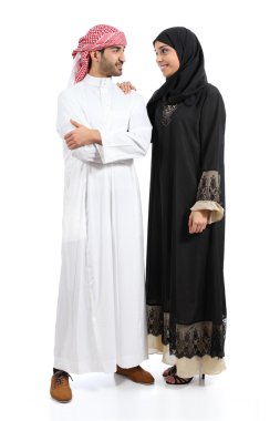Full body of an arab saudi couple posing together clipart