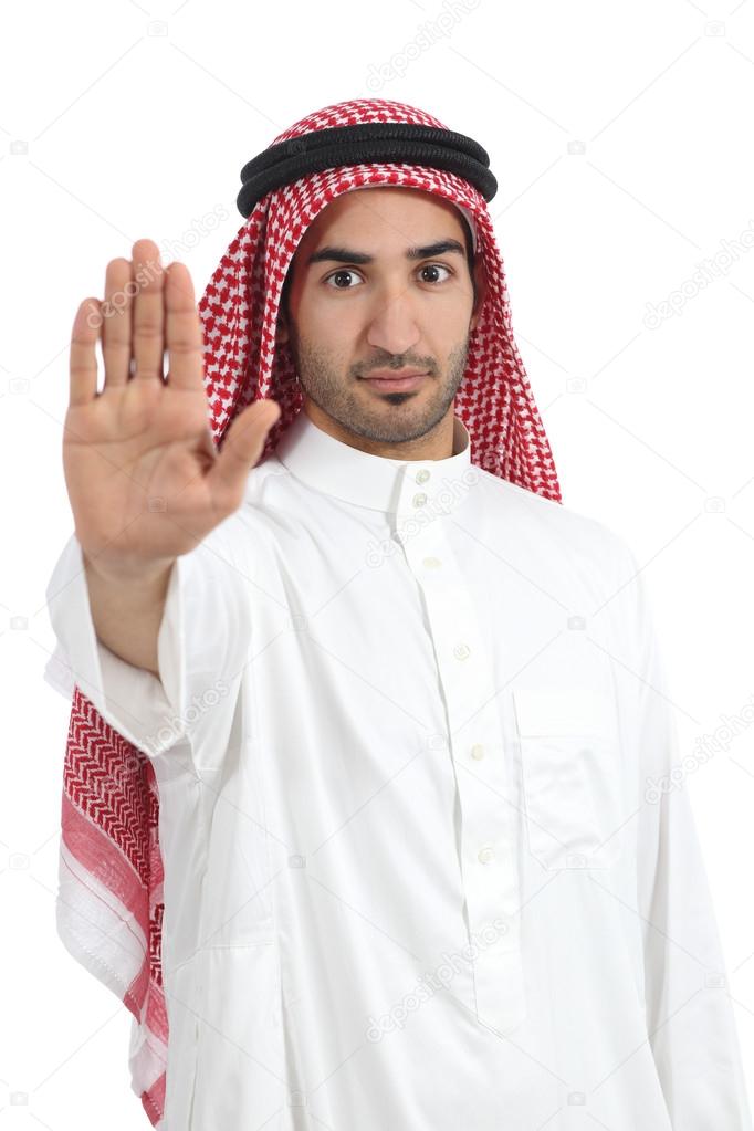 Arab saudi man gesturing stop with his hand