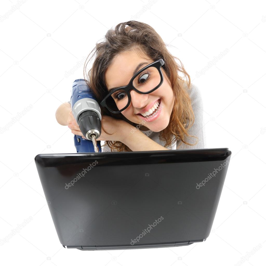 Geek woman repairing a laptop