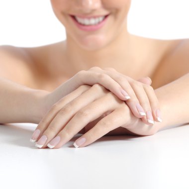 Beautiful woman hands nails with perfect french manicure