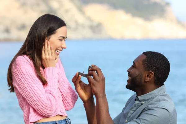 Side View Portrait Happy Interracial Couple Proposing Marriage Beach — стоковое фото