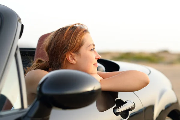 Satisfied Woman Contemplating Views Resting Convertible Car — Stock fotografie