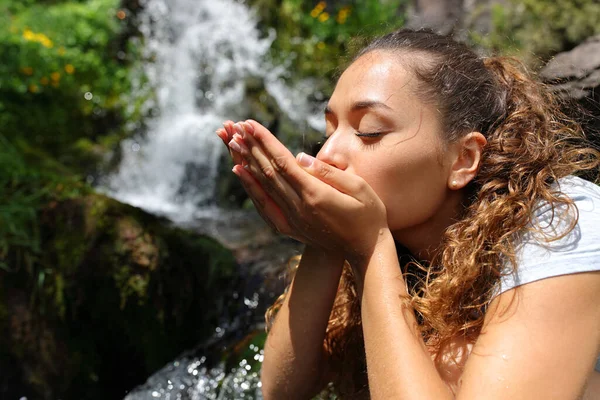 Woman Cupping Hands Drinking Water Waterfall Mountain — Stock fotografie