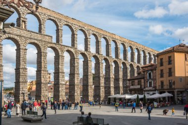 Segovia, Spain, October 2019 - tourists enjoy a beautiful day to visit the Aqueduct of Segovia