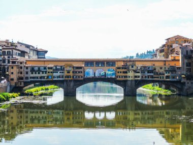 view of Ponte Vecchio and Florence buildings from Ponte Santa Trinita- Florence, Italy