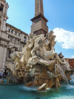 View of Fontana dei Quattro Fiumi (Four Rivers Fountain) at Piazza Navona - Rome, Italy