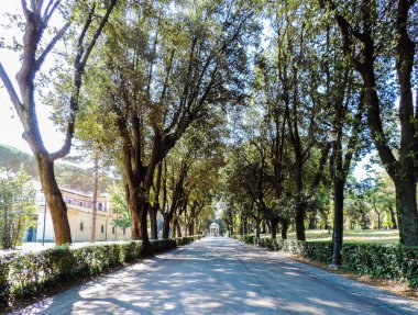Rome, Italy, June 2017 -  view of a pathway at Villa Borghese - Rome, Italy