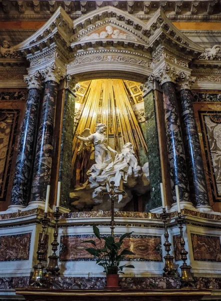 Rome, Italy, June 2017 - view of L'Estasi di Santa Teresa (The Ecstasy of Saint Teresa) at an altar of Santa Maria della Vittoria 