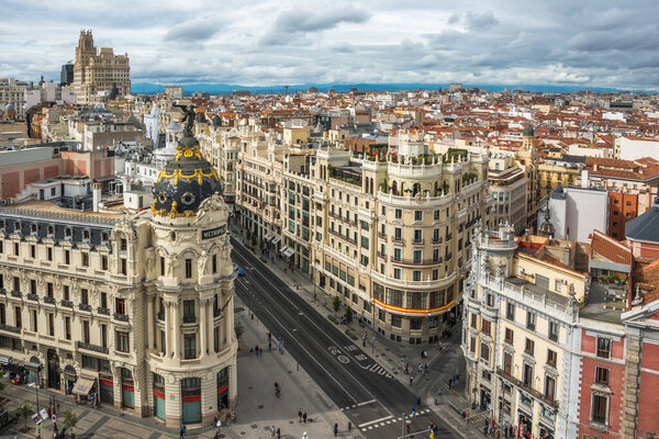 Madrid, Spain, October 2019 - view of the Metropolis Building and the Gran Va