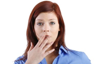 Woman with hand over mouth