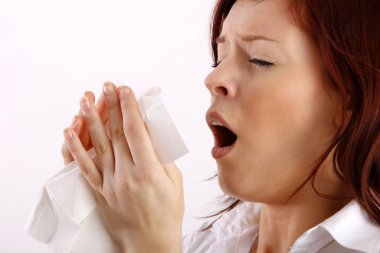 Woman blowing her nose clipart