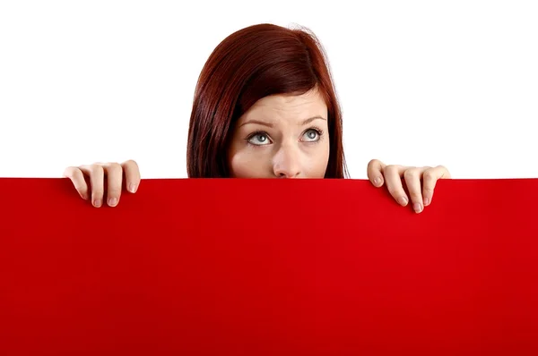 Young woman holding blank sheet — Stock Photo, Image