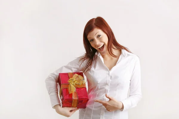 Woman holding gift box — Stock Photo, Image