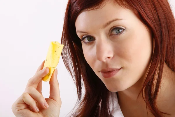 Mulher comendo queijo — Fotografia de Stock