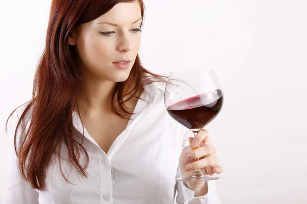 Beautiful young woman enjoying wine — Stock Photo, Image