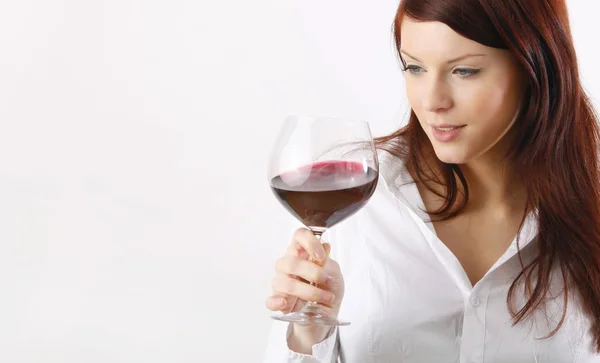 Beautiful young woman enjoying wine — Stock Photo, Image