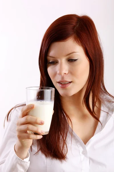 Cara de mujer bebiendo leche —  Fotos de Stock