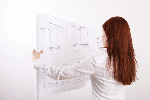 Beautiful businesswoman engineer with the work-plan — Stock Photo, Image