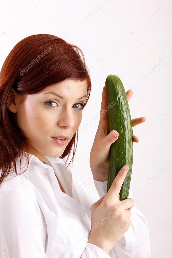 Girl with cucumber