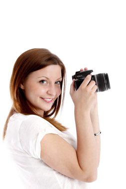 kız beyaz bir gömlek bir kamera ile poz