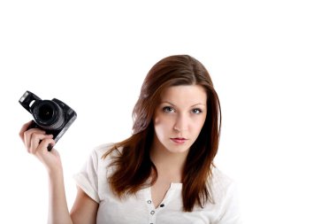 kız beyaz bir gömlek bir kamera ile poz