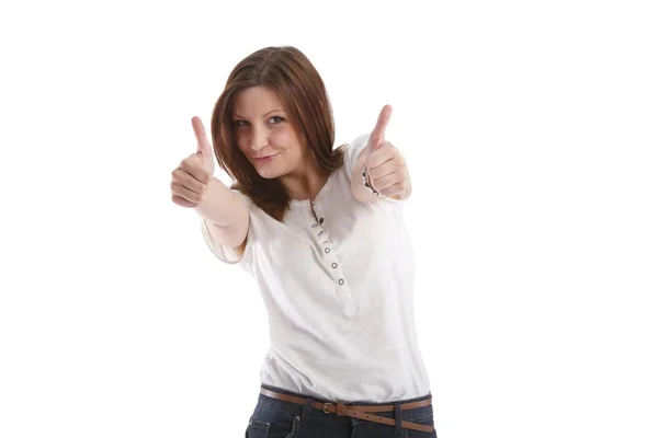 Chica posando en una camiseta blanca y pantalones vaqueros muestra un signo — Foto de Stock