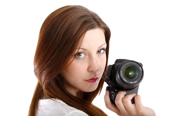 Menina posando em uma camisa branca com uma câmera — Fotografia de Stock