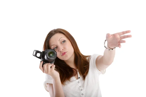 Menina posando em uma camisa branca com uma câmera — Fotografia de Stock