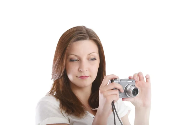 Menina posando em uma camisa branca com uma câmera — Fotografia de Stock