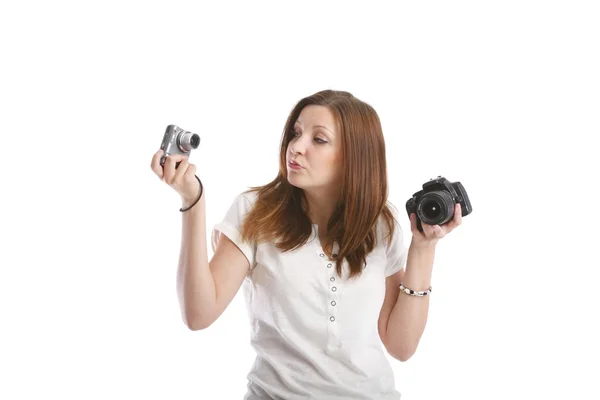Girl posing in a white shirt with cameras — Stock Photo, Image