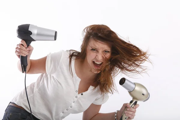 Chica con secadores de pelo en las manos de —  Fotos de Stock