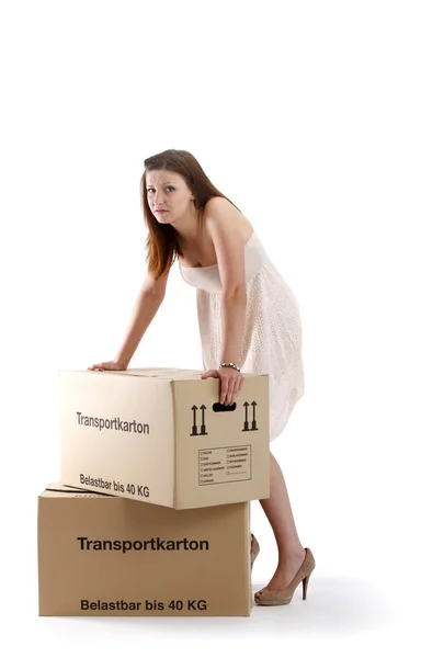 Chica en vestido blanco con cajas — Foto de Stock