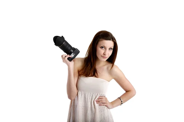 Girl posing in a white shirt with a camera — Stock Photo, Image