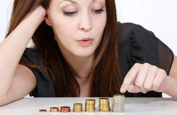 Mulher de negócios com calculadora e dinheiro — Fotografia de Stock