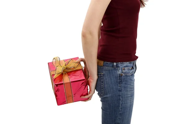 Girl with a gift in their hands — Stock Photo, Image