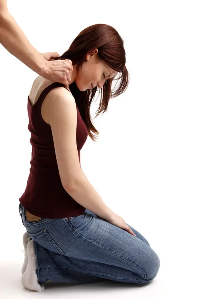 Man makes a girl a shoulder massage — Stock Photo, Image