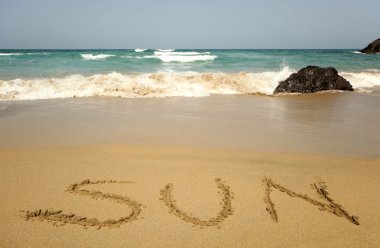 kumlu sahilde kelime