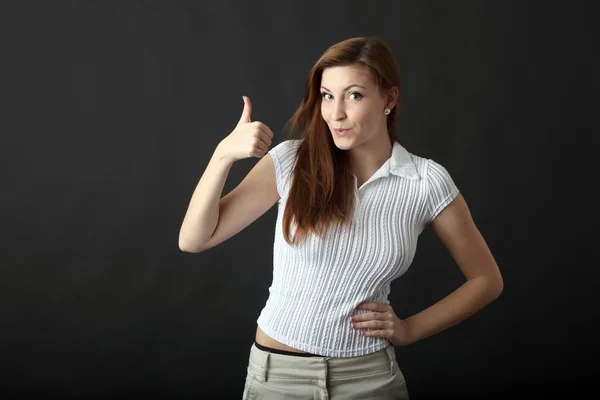 Young woman with thumbs up — Stock Photo, Image