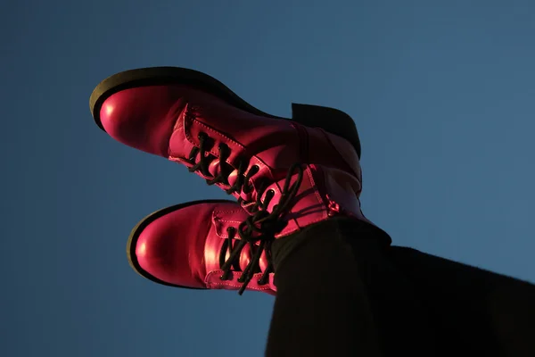 Red female shoes on a foot — Stock Photo, Image