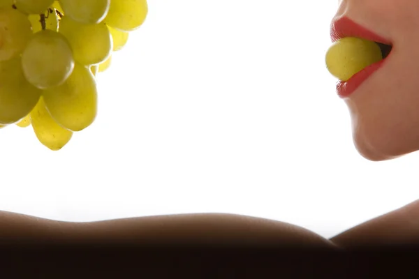 Girl with grapes — Stock Photo, Image