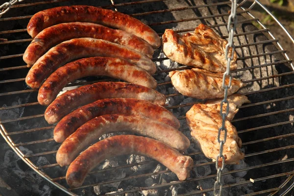 Sausages on the grill — Stock Photo, Image